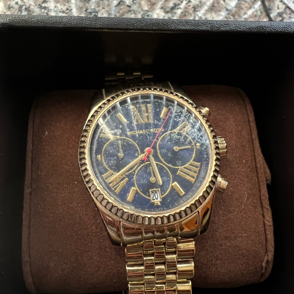 Two (2) michael kors watches .